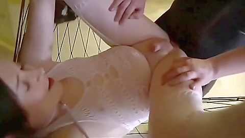 Busty brunette fucks a shemale in the bed in stockings