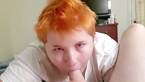 Redhead with tattoos in her ass is doing a deep throat