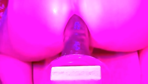 Big booty chick is getting fucked by a dildo in her big pussy